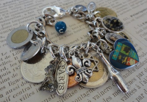 Charms & coins collected from her travels around the world.
