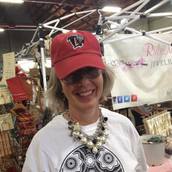 Junk In The Trunk Vintage Market shopper wearing her Ruby Mae piece