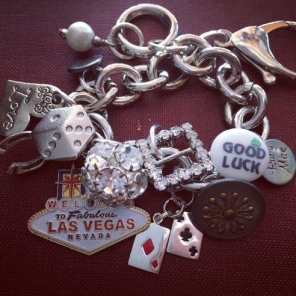 This Vegas inspired bracelet was scooped up from my Ruby Mae Jewelry Facebook post by Sharon who loves to gamble. The bling centerpiece is actually a vintage button. The rhinestone buckle is oh so sweet and the playing cards are sterling silver charms. I thought the metal button resembled a roulette wheel. Good luck gambling Sharon.