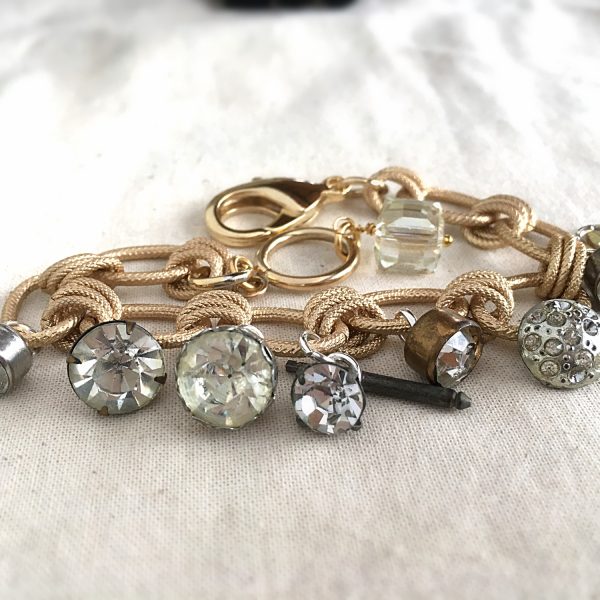 Shieri picked this piece up at the recent HIghland Yard Vintage in Chandler. The buttons are all antique and so is the rhienstone cufflink. This bracelet looked so pretty on her.
