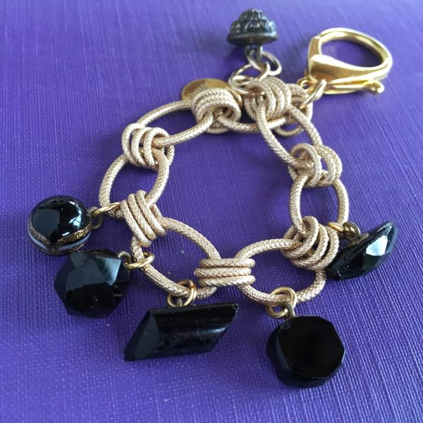 Yolanda’s Black Glass Beauty – 1860’s black glass buttons