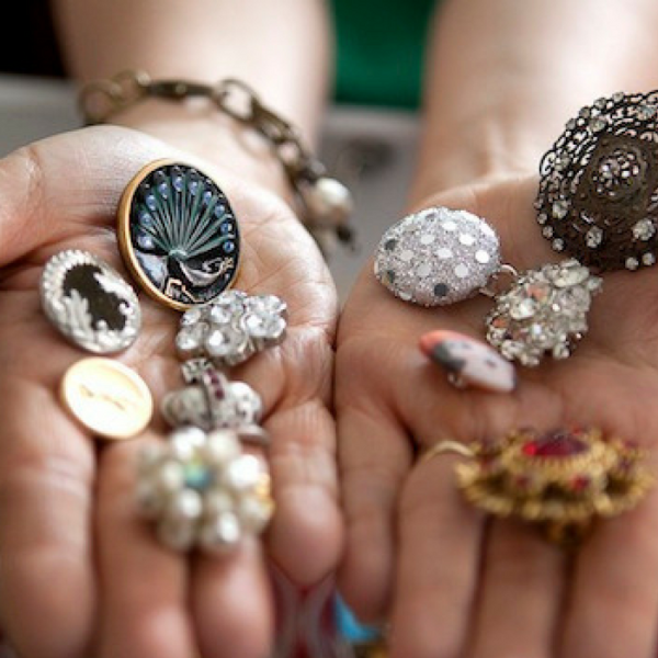 Go Daddy photo of my hands with cool buttons used in their promotions