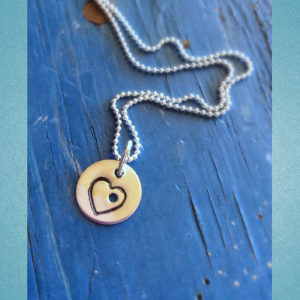 charmholeheartnecklae.jpg.